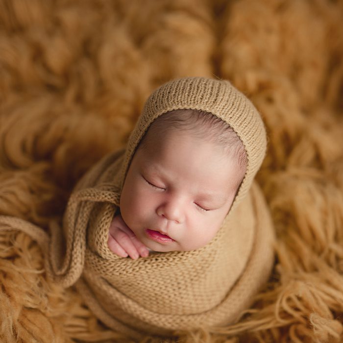 newborn wrapped in mustard yellow wrap and bonnet - newborn gallery link